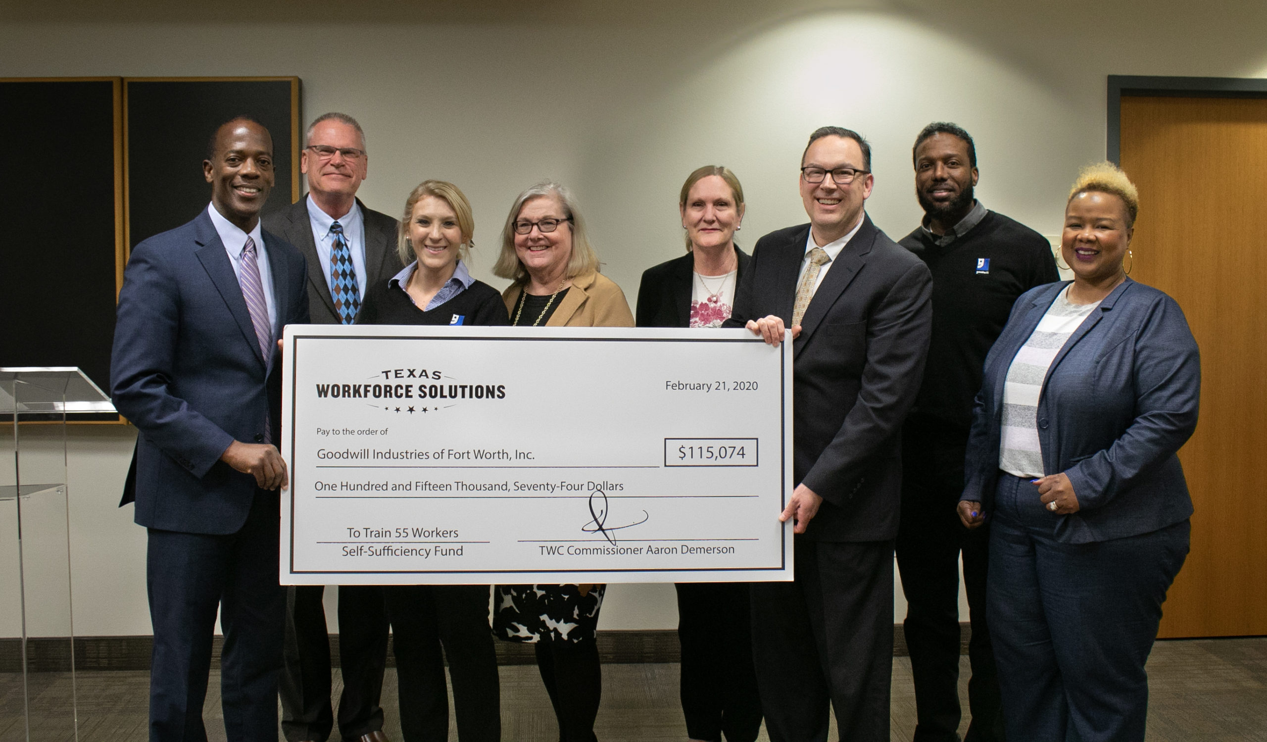 Goodwill North Central Texas accepting Grant check from Texas Workforce Commission