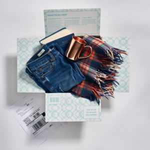 pile of clothes folded inside a box