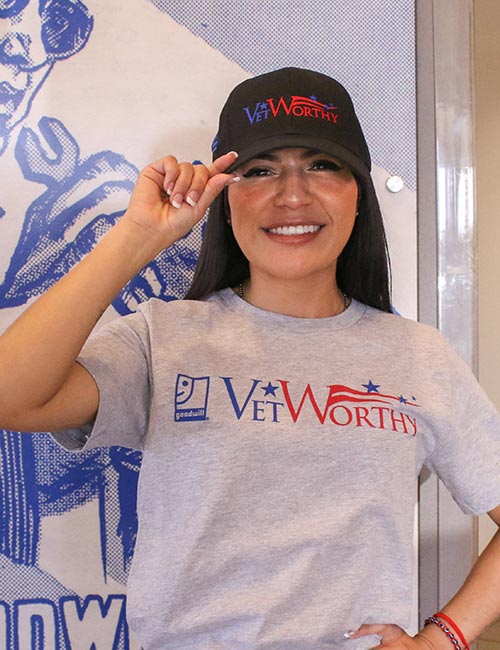 Woman in Vet Worthy hat and t-shirt